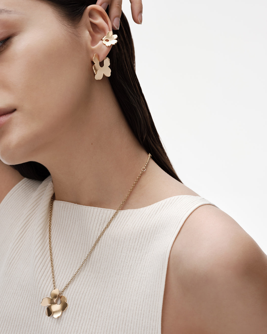 Unikko-korvakorut pienet pronssi puolipari oikea