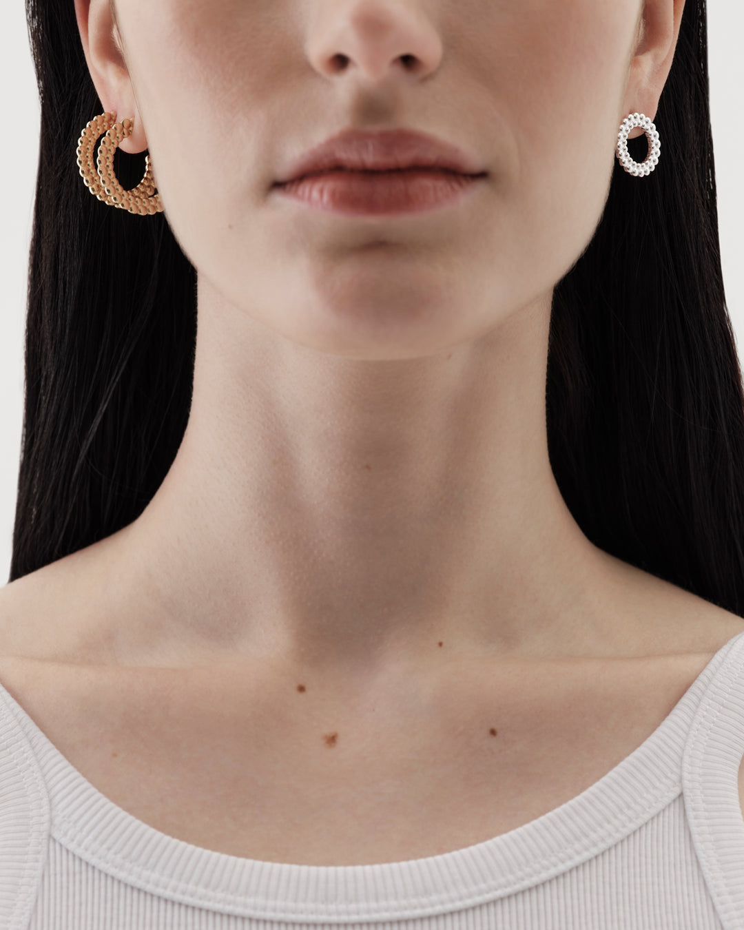 Valoisa-nappikorvakorut isot pronssi