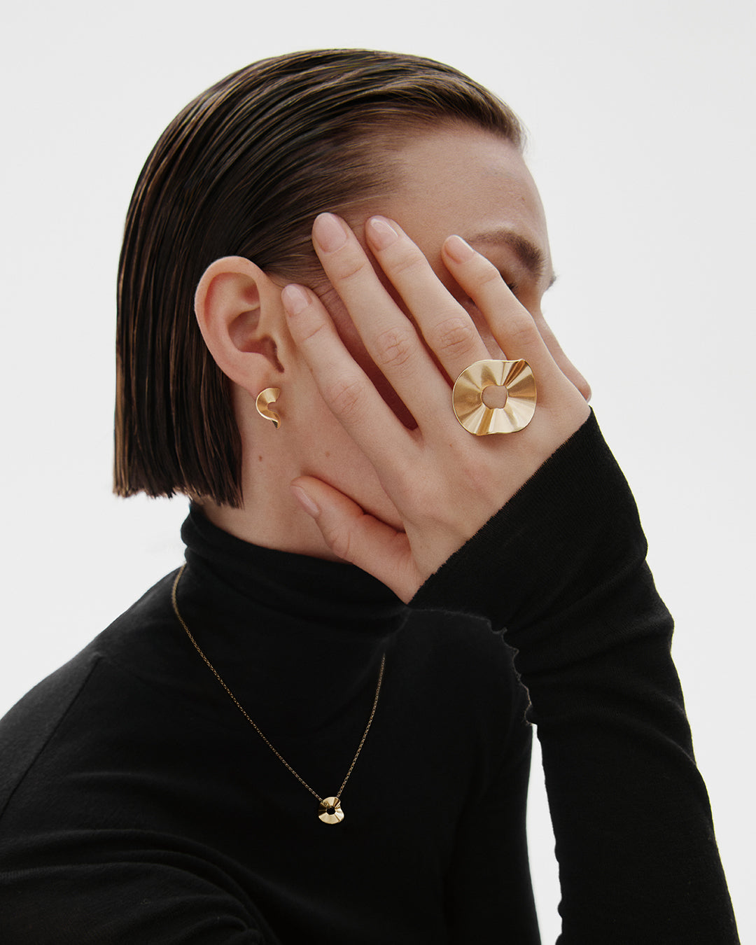 Vetovoima-korvakoru pieni pronssi yksi kappale oikea