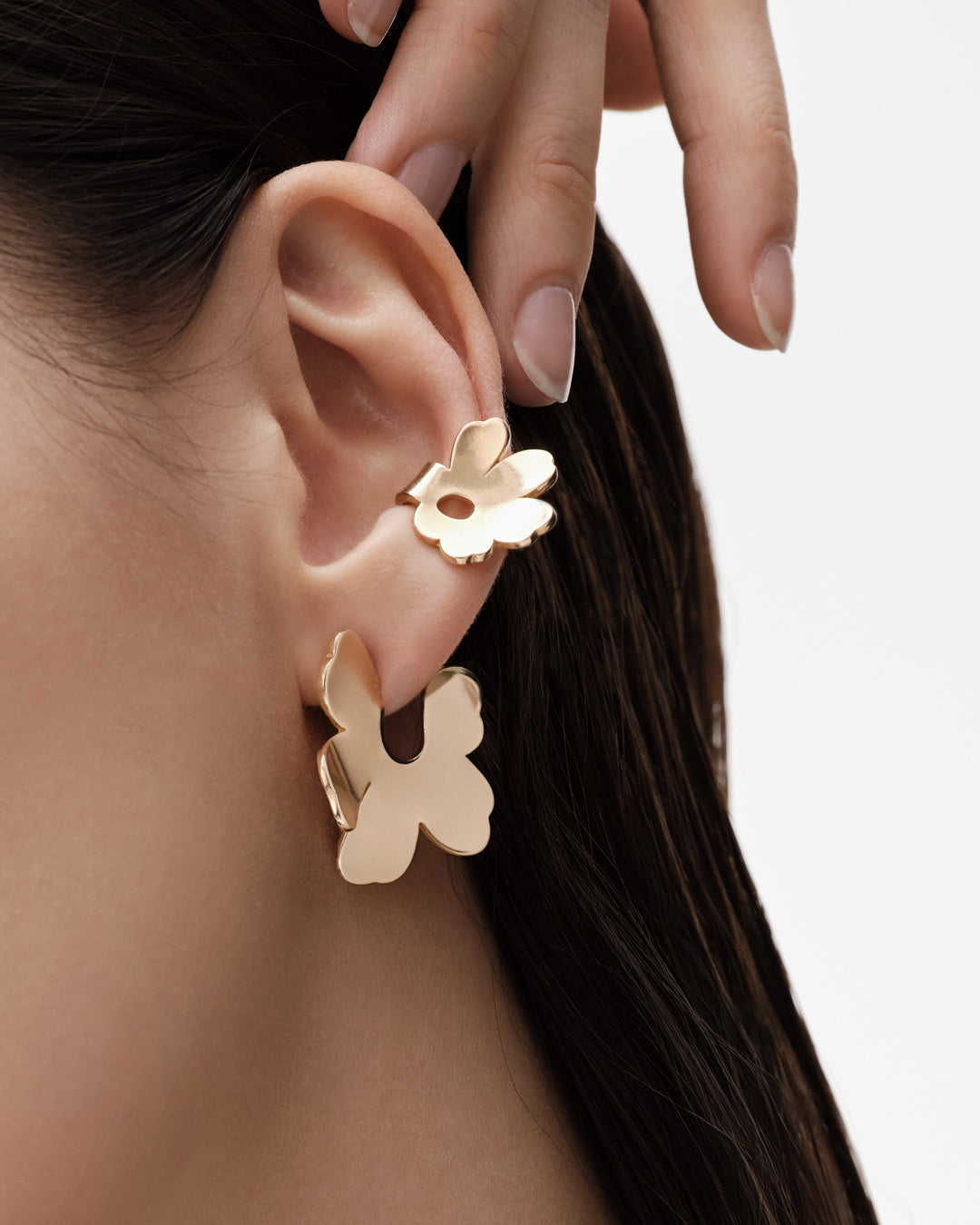 Unikko-korvakorut pienet pronssi