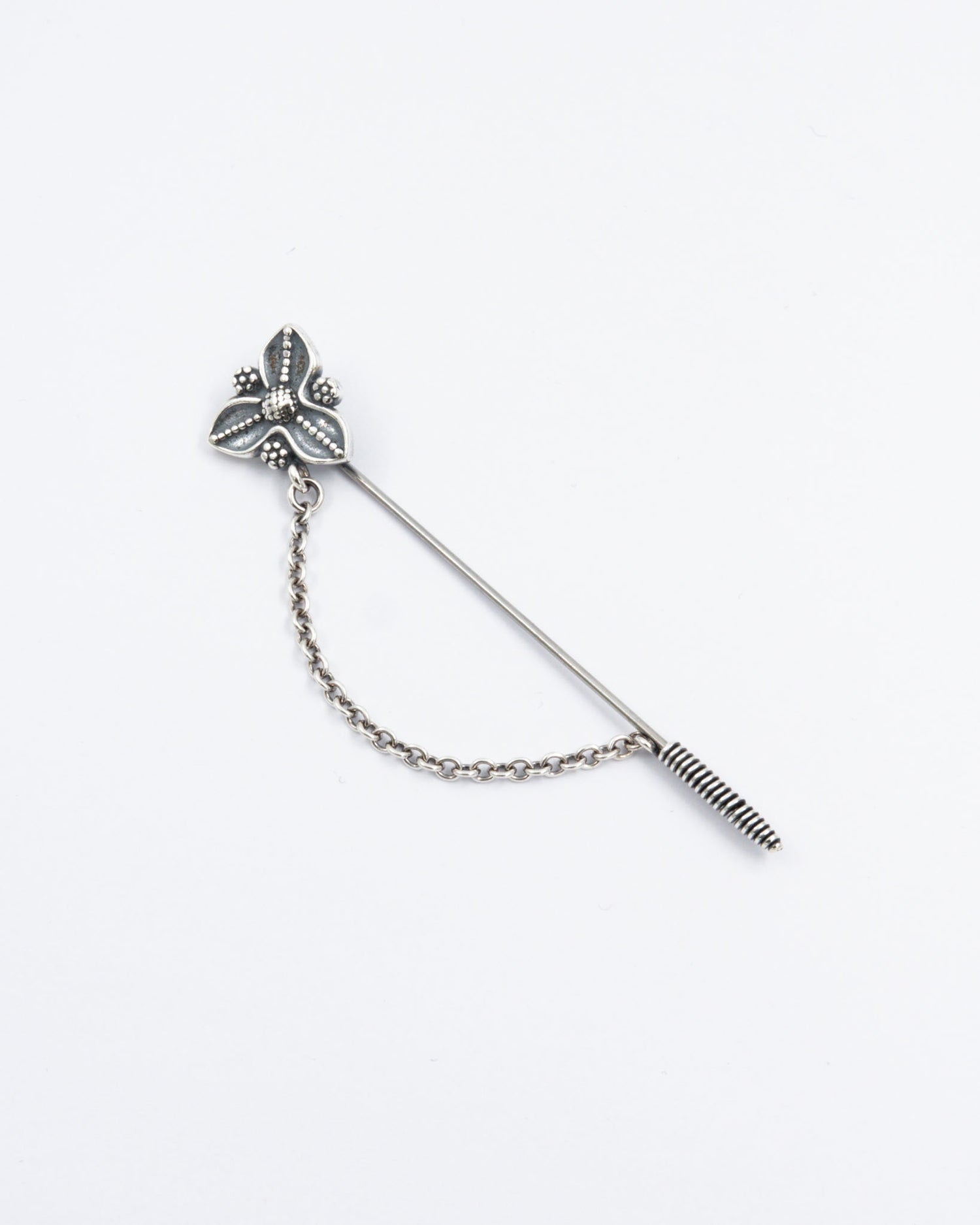 Pidetty Lyypekin kukkaneula hopea