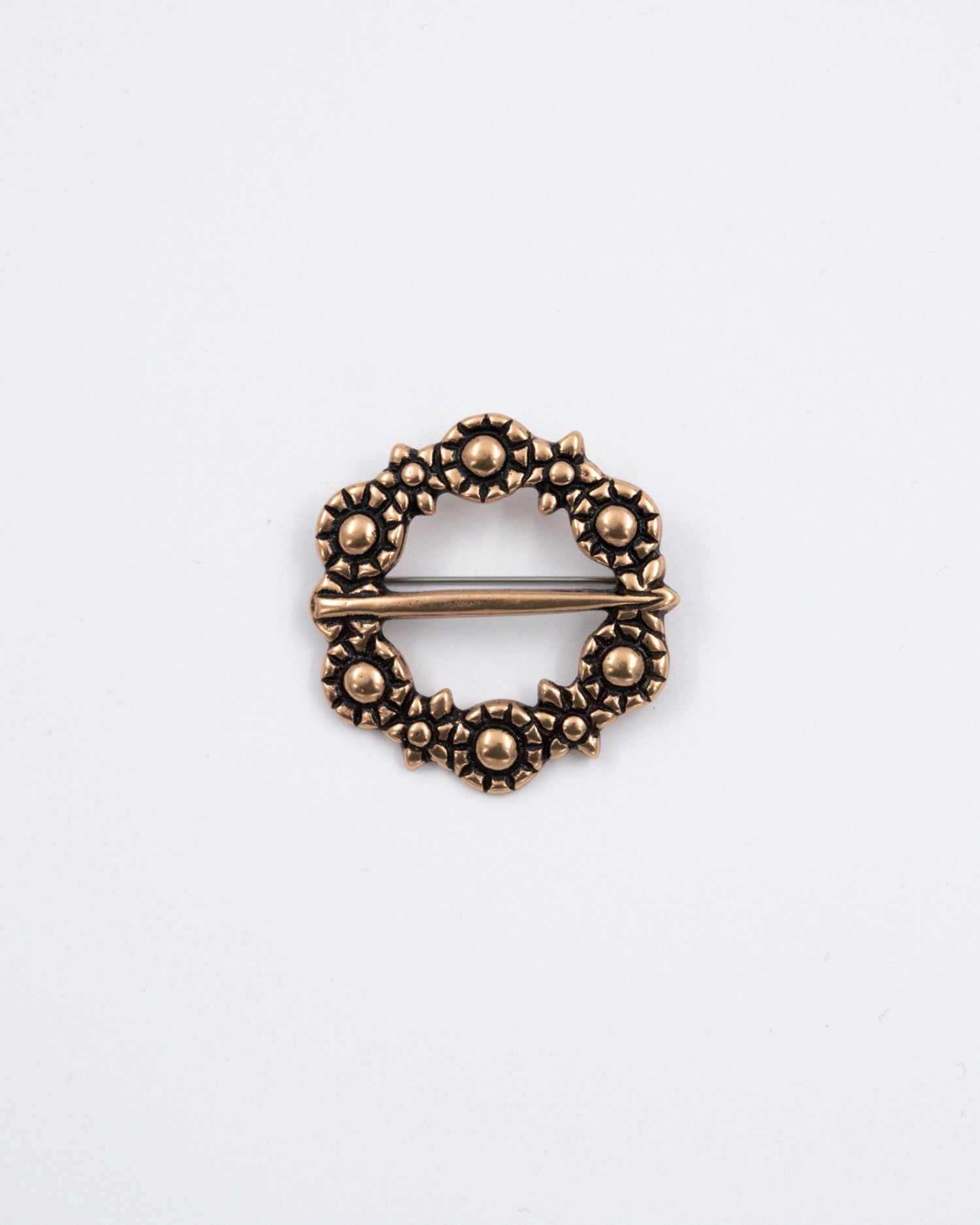 Pidetty Kukkasolki pronssi