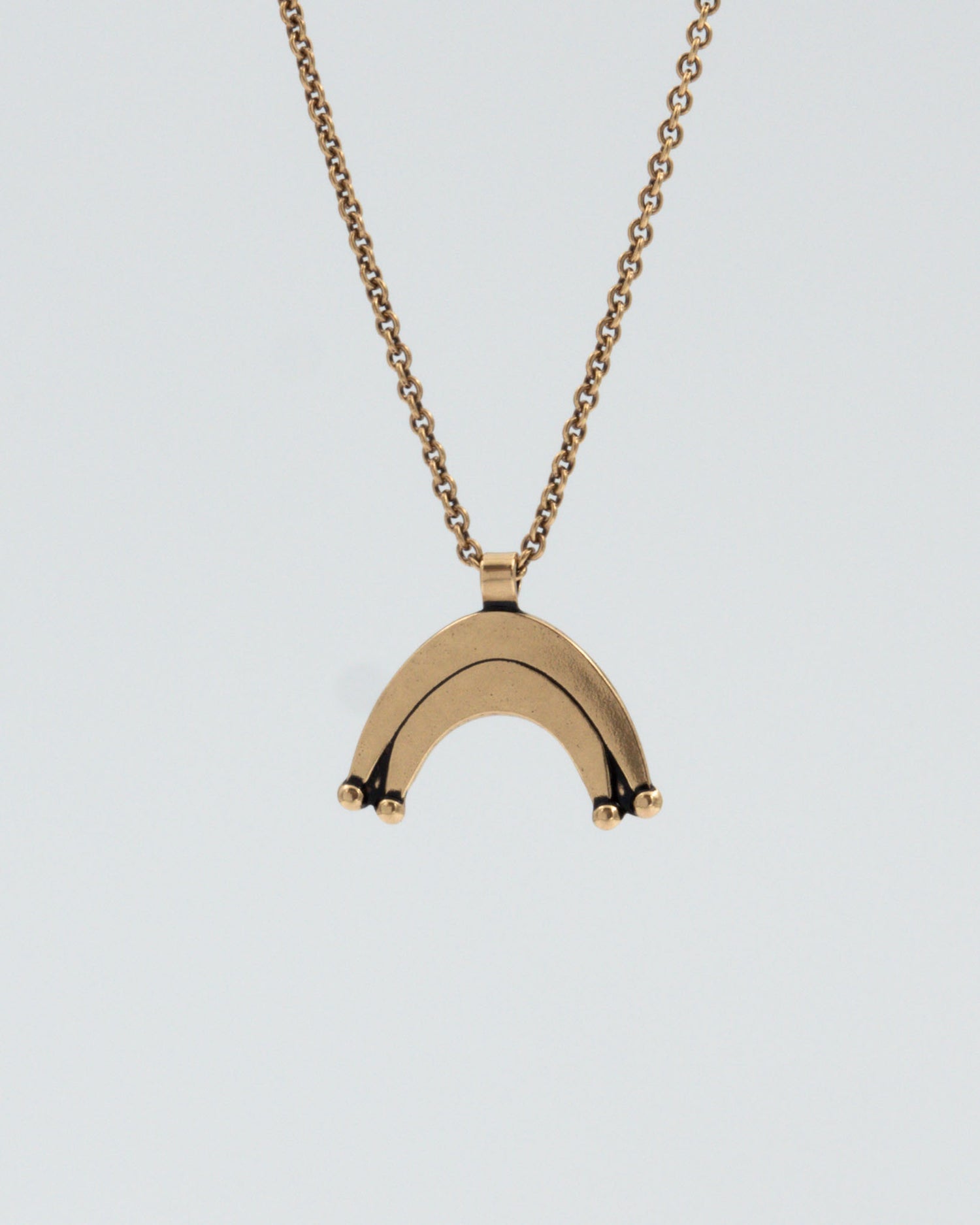 Pidetty Lunula-riipus pronssi