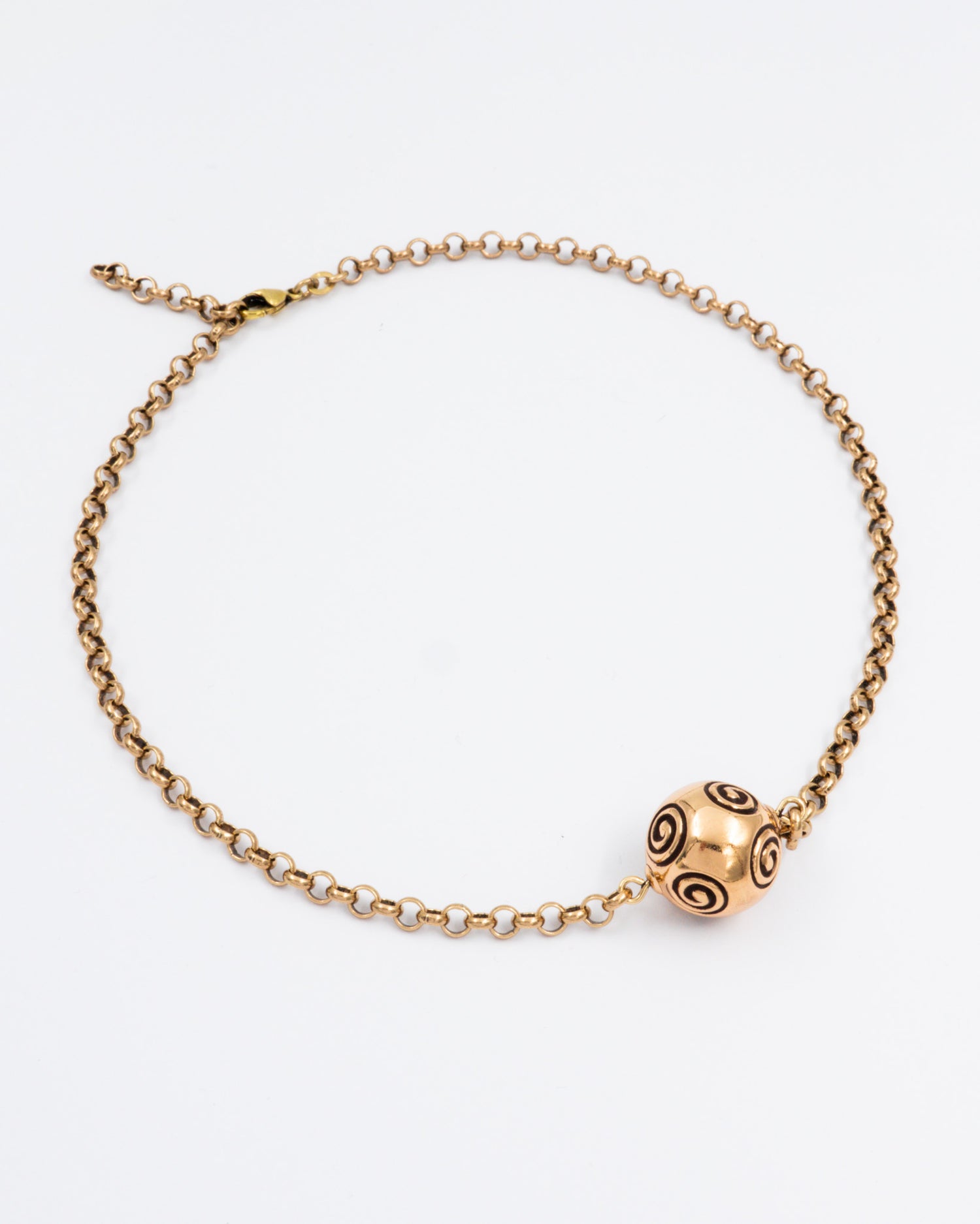 Pidetty Halikon spiraalipallo -kaulakoru pronssi