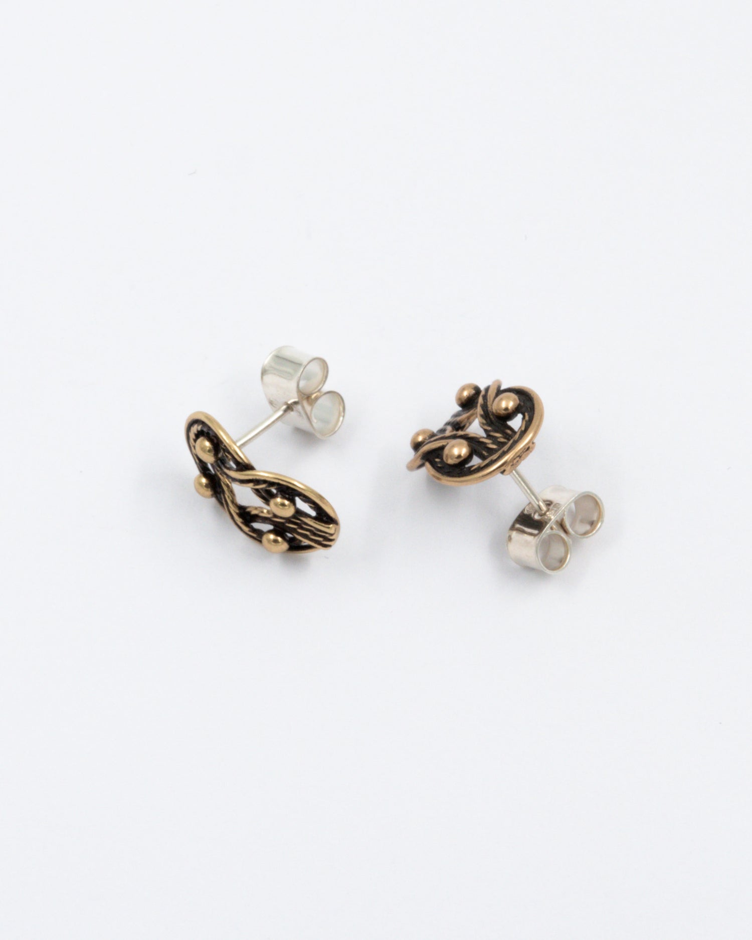 Preloved Teljänneito stud earrings bronze