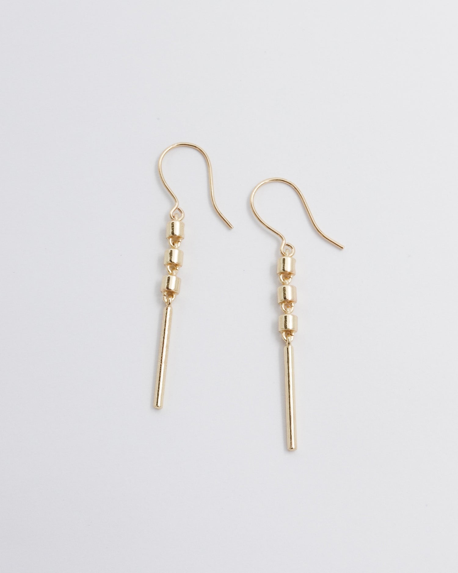 Pidetty Jive-korvakorut pronssi