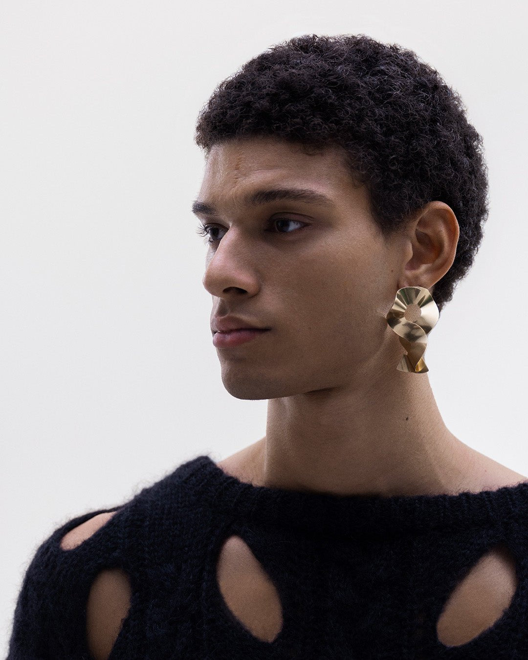 Vetovoima earrings large silver half pair left