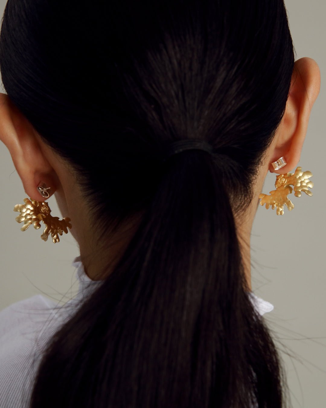 Tundra-korvakorut pronssi