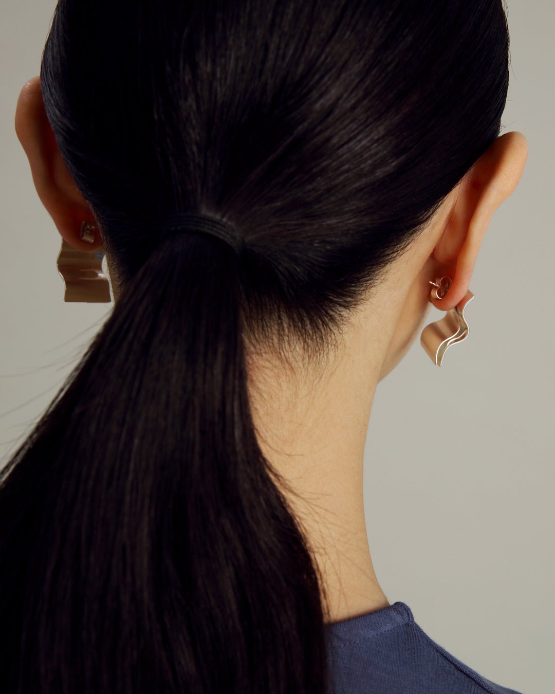 Vetovoima-korvakorut hopea