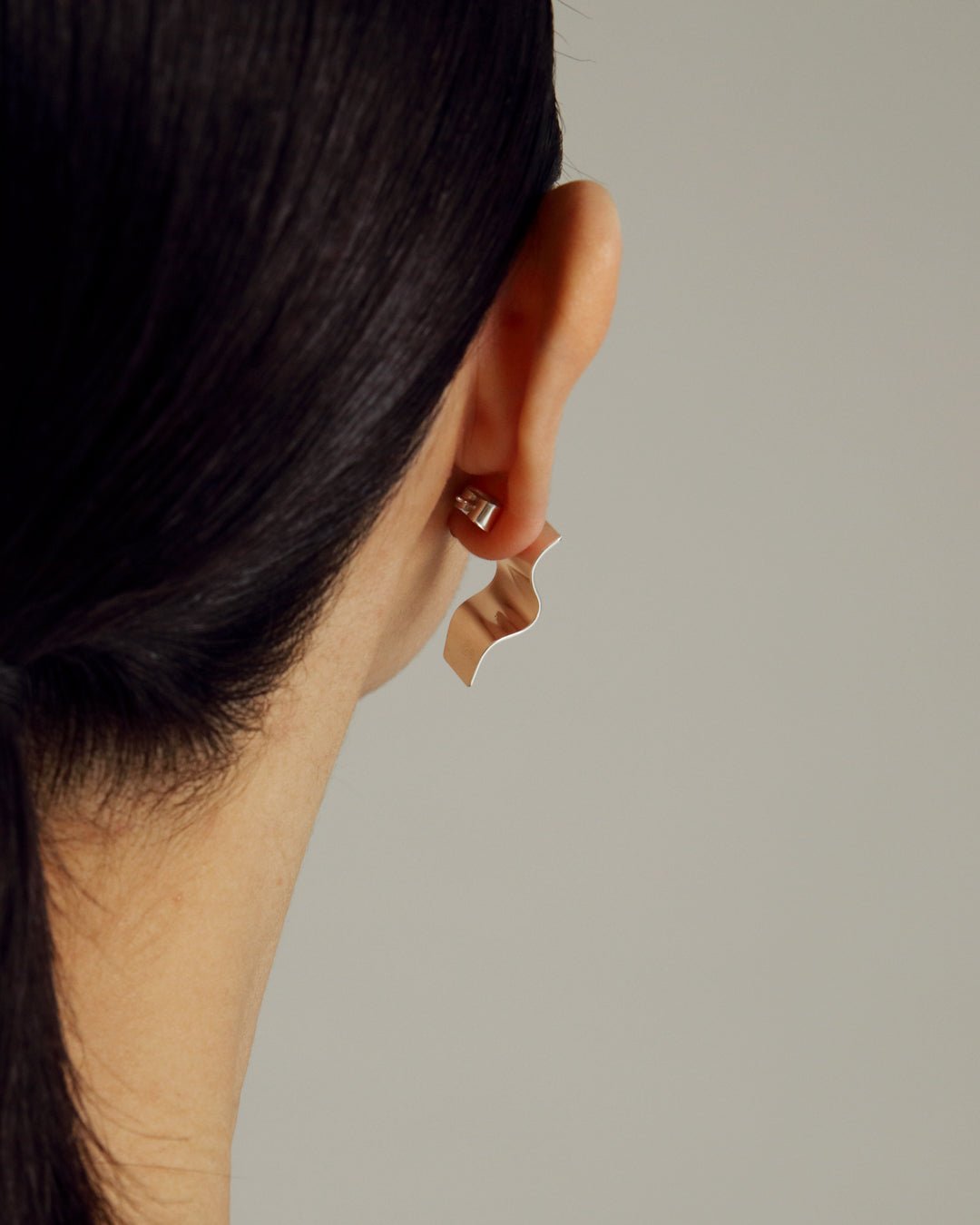 Vetovoima-korvakorut hopea