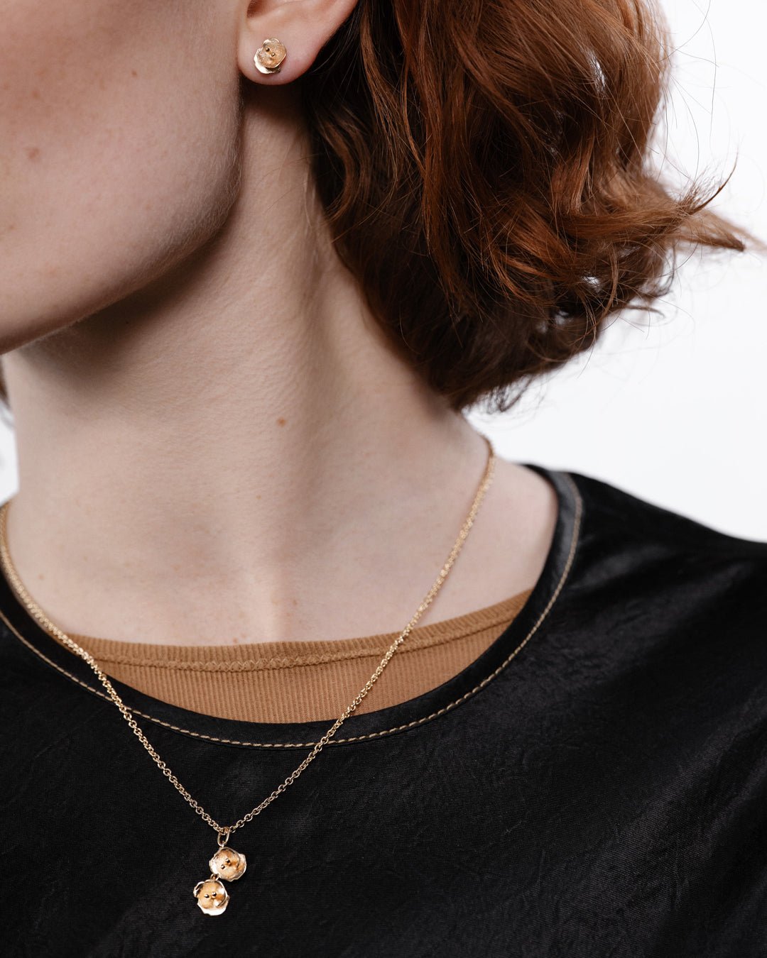 Kesäyön ruusu -minikorvakorut kulta puolipari vasen