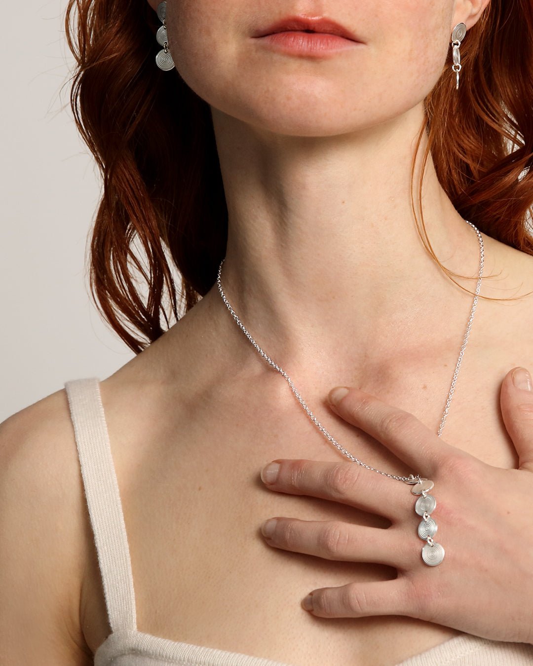 Kosmos earrings 3 parts silver half pair left