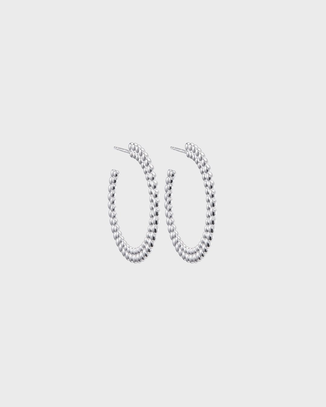 Circle of Light big hoop Earrings silver half pair left