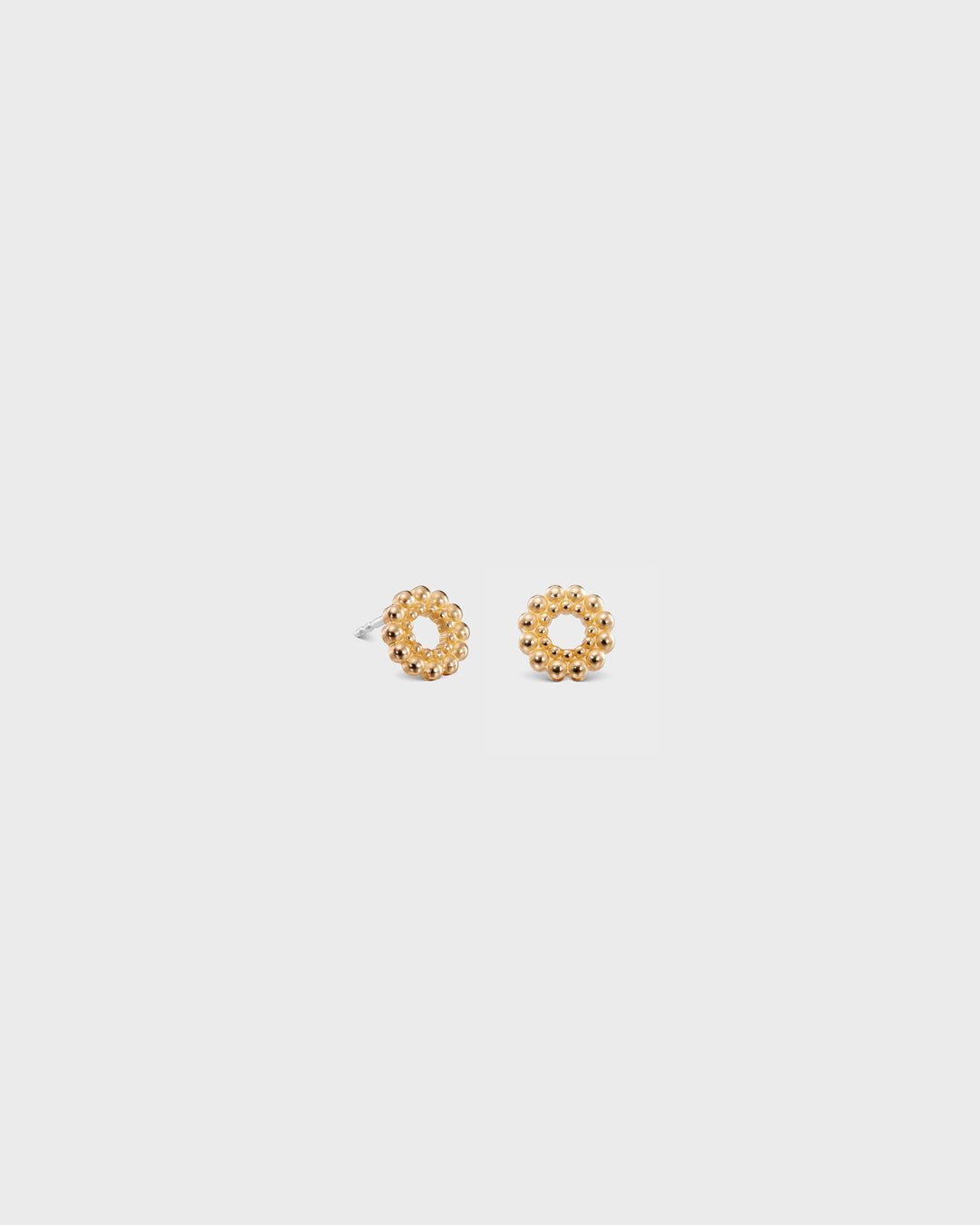 Valoisa stud earrings bronze half pair left