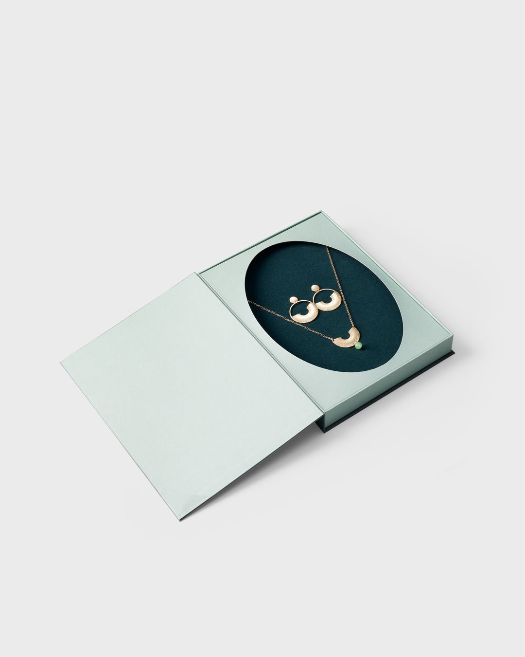 Kaaria earrings bronze half pair left