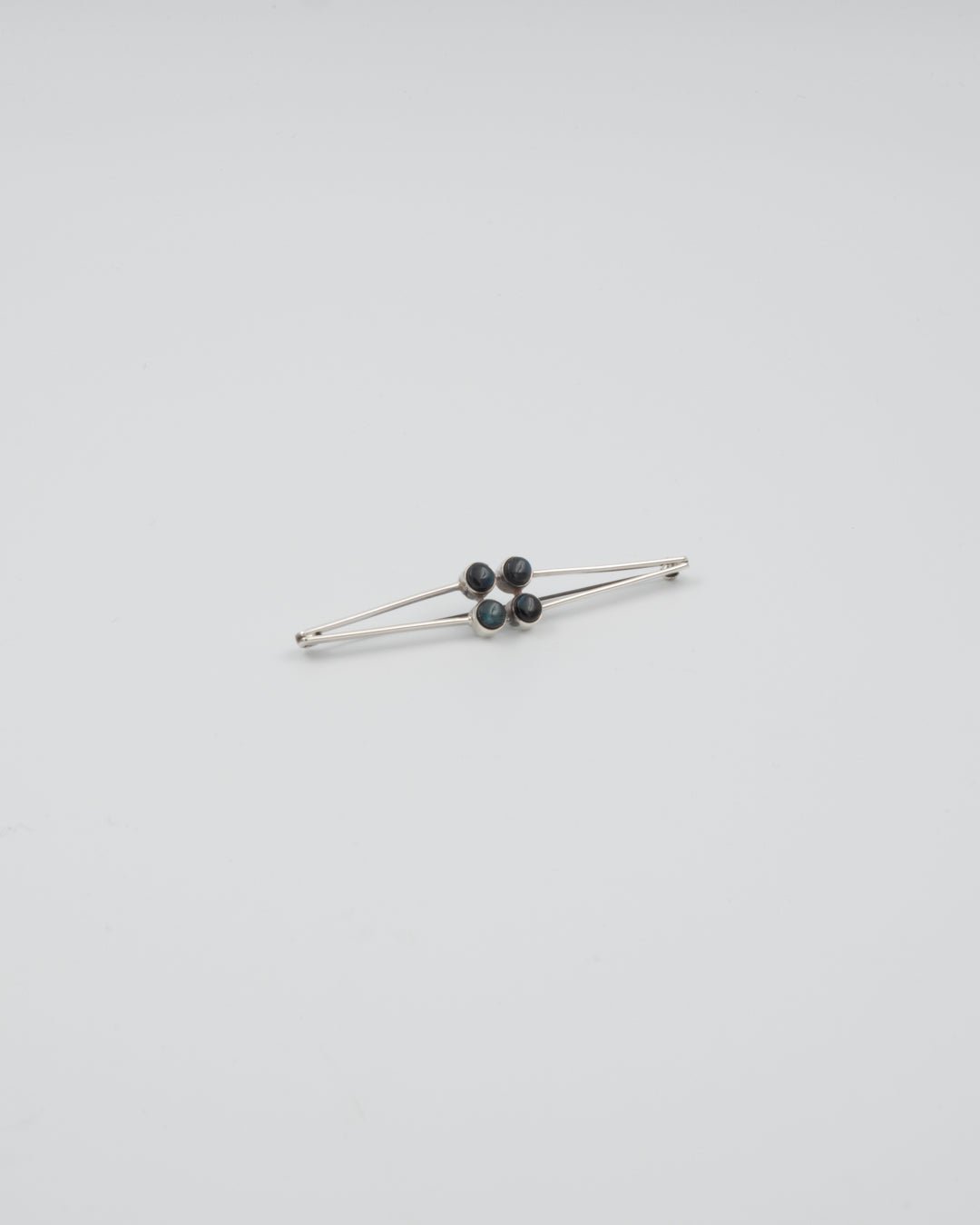 Pidetty solki hopea spektroliitti