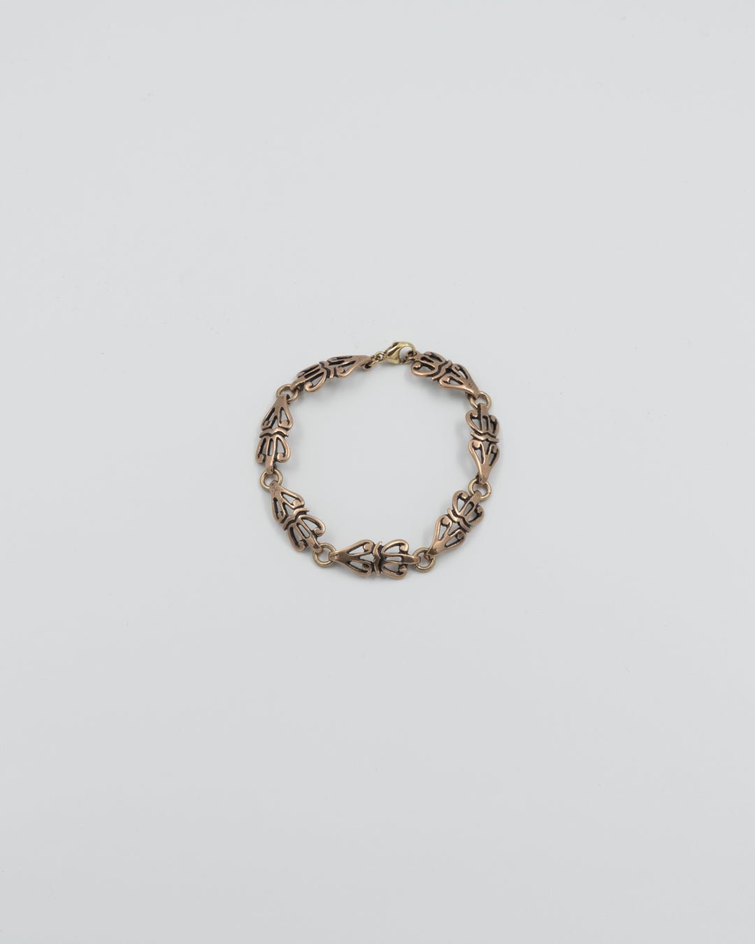 Pidetty Aurinkoleijona-rannekoru 7-osainen pronssi