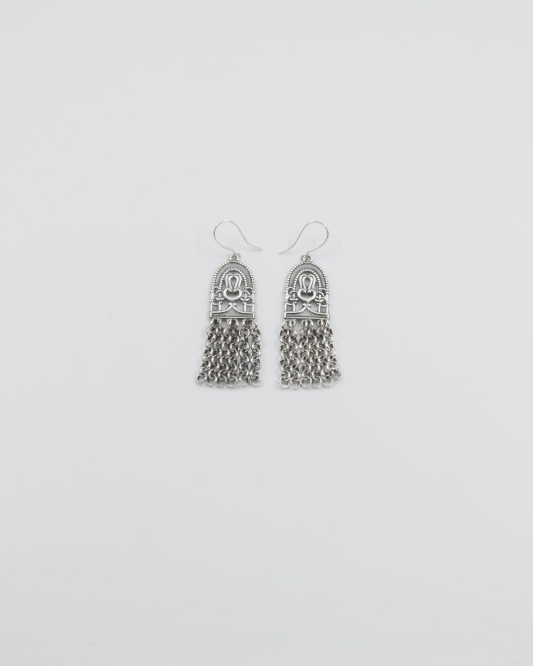 Pidetty Paratiisi-korvakorut hopeoitu pronssi