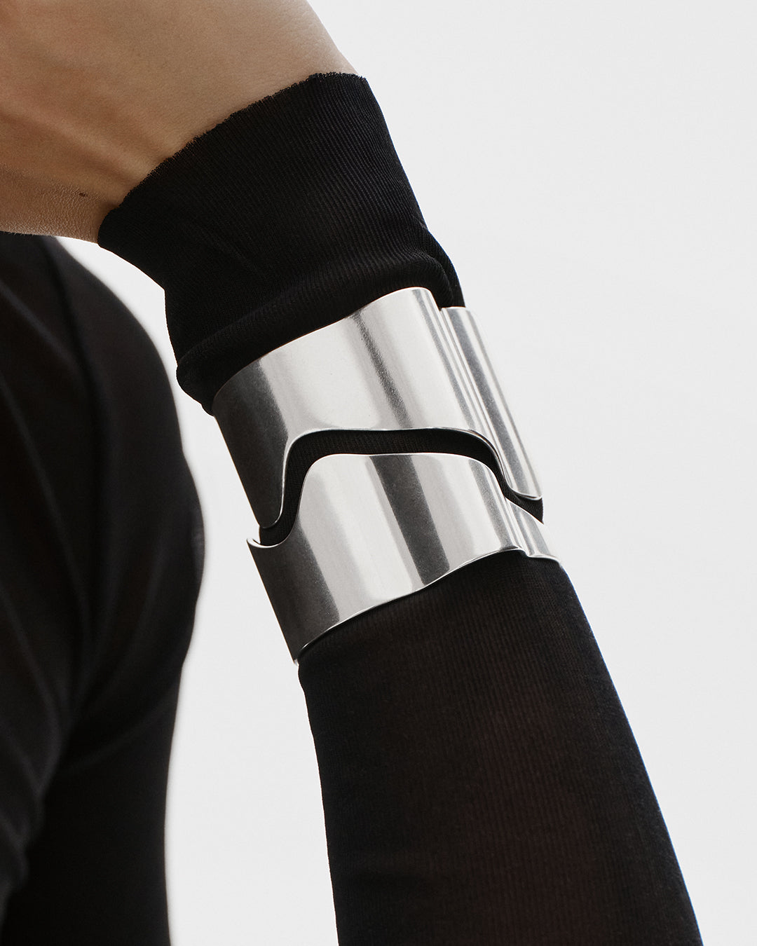 Vetovoima-rannekoru leveä pronssi