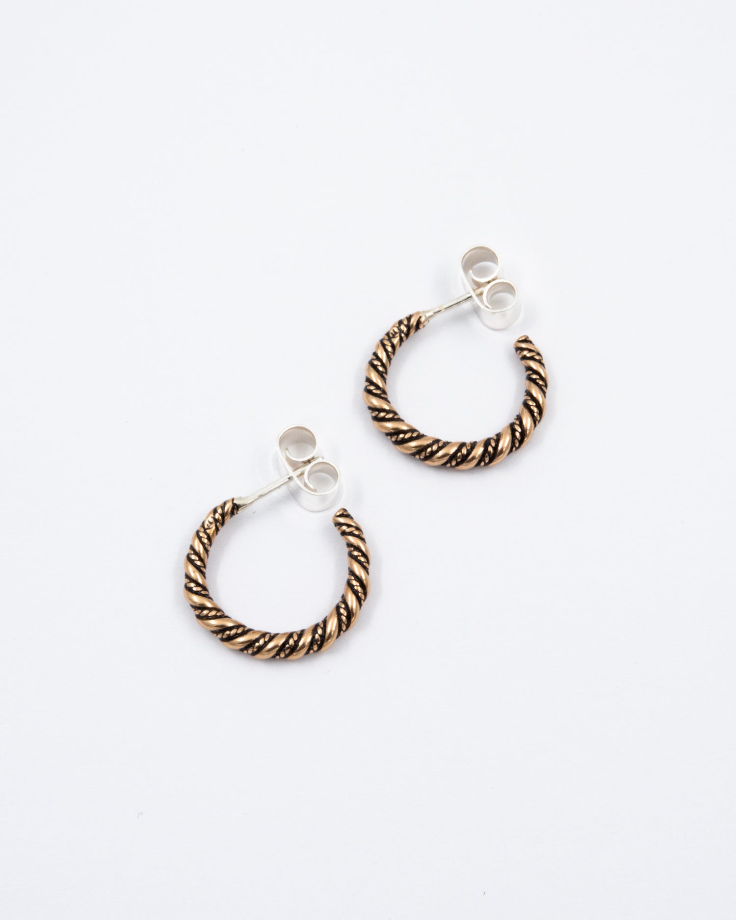 Kept Haliko's spiral earrings bronze