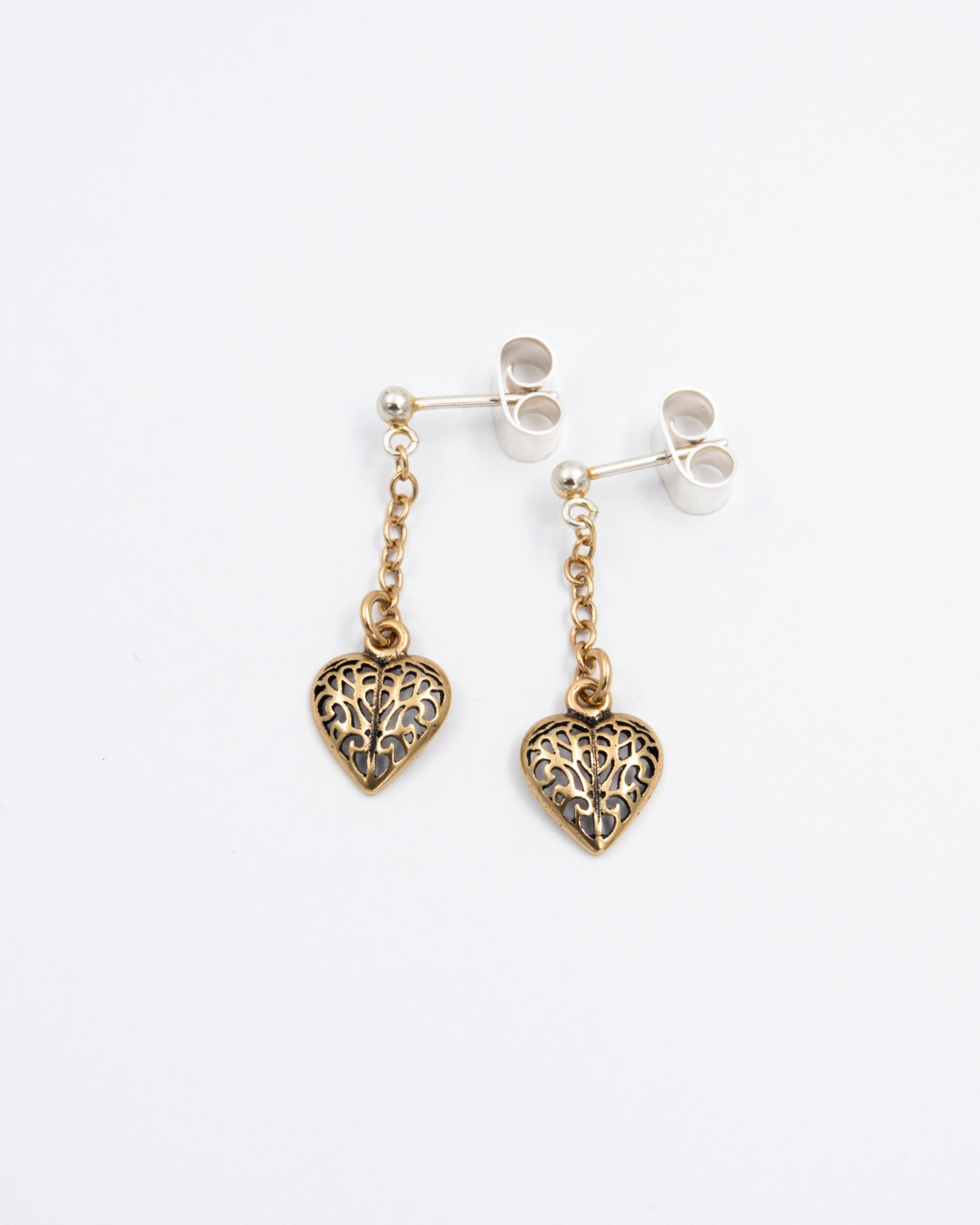 Pidetty Onnensydän-korvakorut ketjulla pronssi