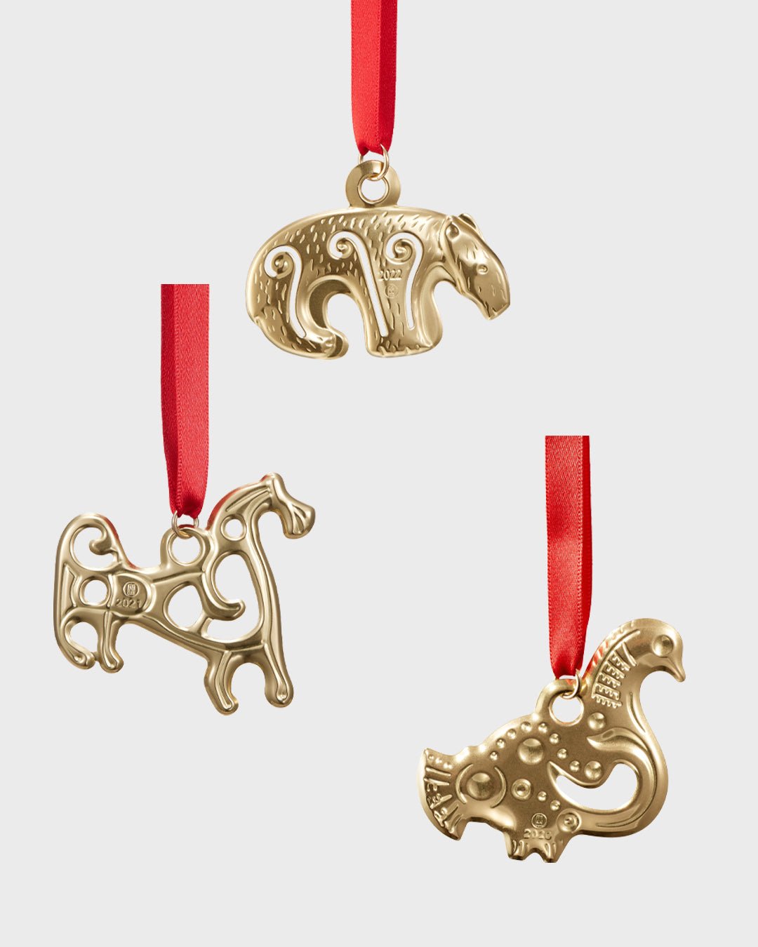 Kolmen joulukoristeen lahjapakkaus