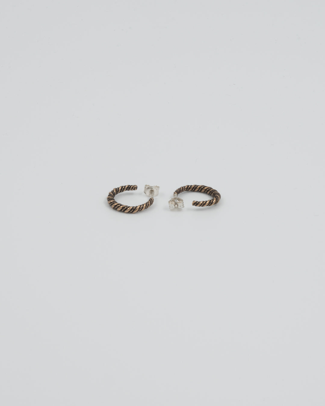 Kept Haliko's spiral earrings bronze